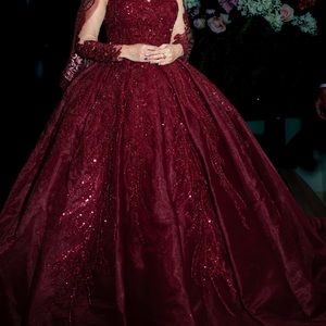 Red bridal dress, red veil with red crown